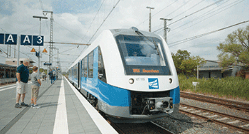 Passengers waiting on the platform for the arrival of a regional train from Bentheimer Eisenbahn AG